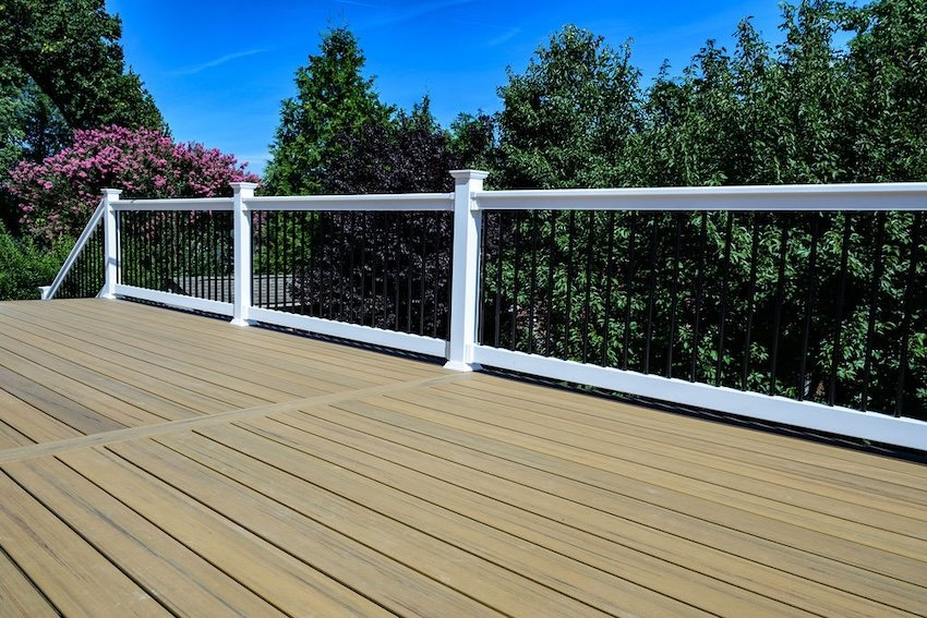 coconut-husk-dark-cocoa-composite-deck-catonsville - thefinalcuthomeimprovementllc.com TimberTech Coconut Husk decking with Dark Cocoa accent borders on a custom deck in Catonsville MD