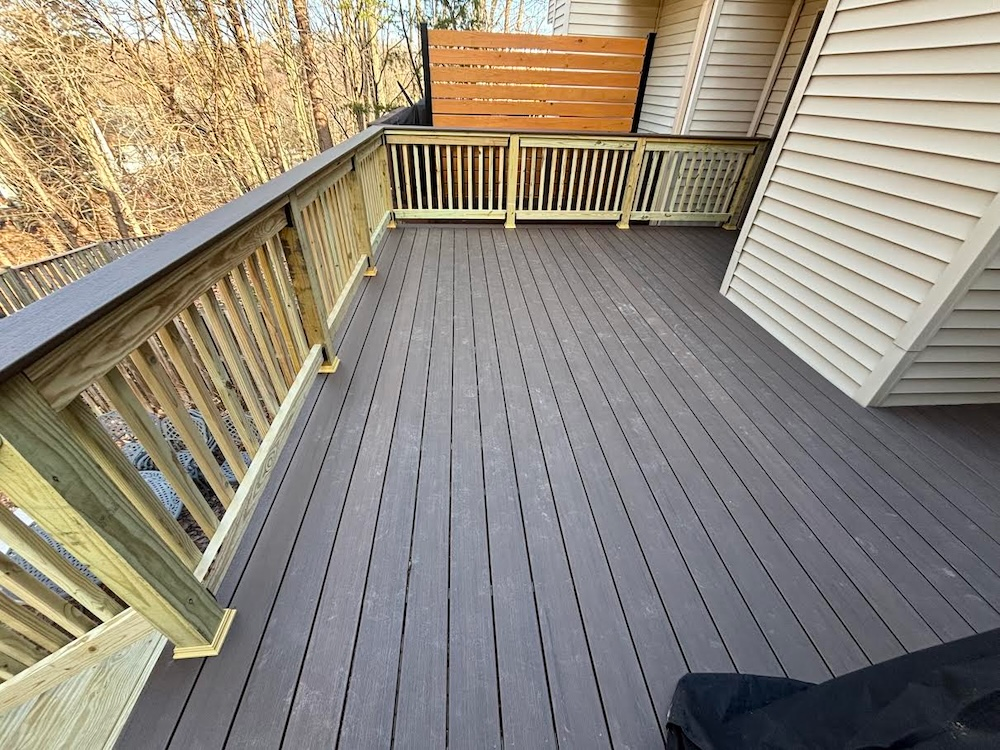 Custom townhouse deck featuring composite decking in Elkridge MD