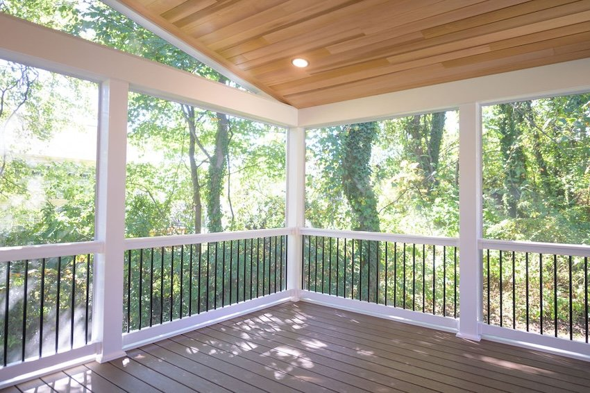 Corner view of screened porch with wooded backyard views in Perry Hall Maryland